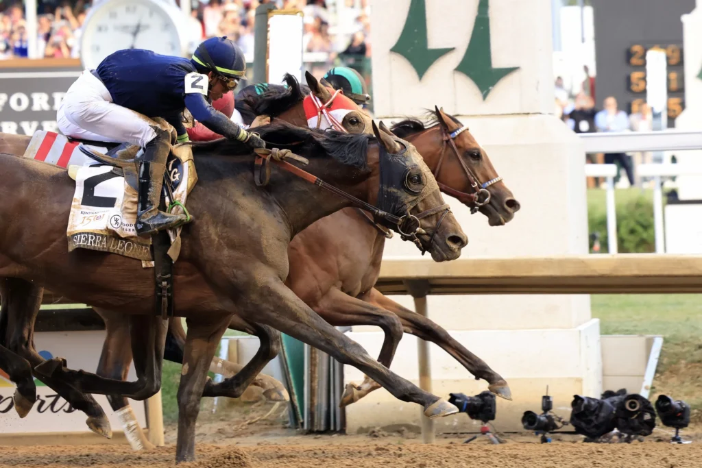 Horses sprint down the Churchill Downs stretch during the 2025 Kentucky Derby.